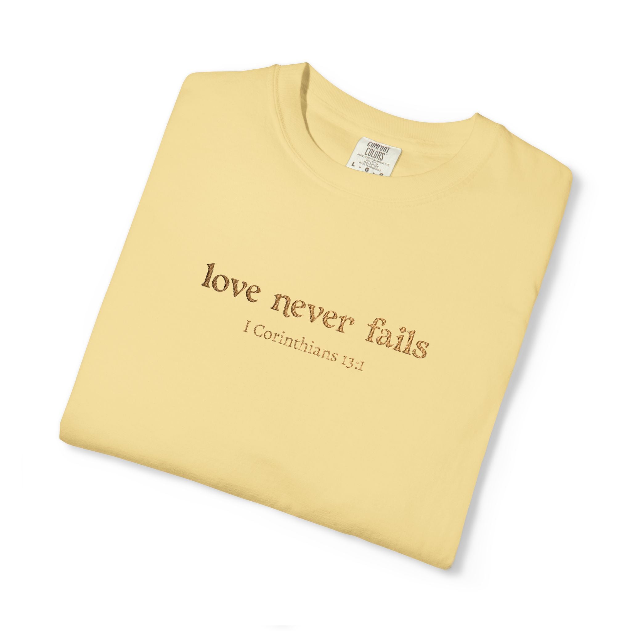 Love Never Fails Tee | Garment-Dyed 1 Corinthians Scripture T-Shirt