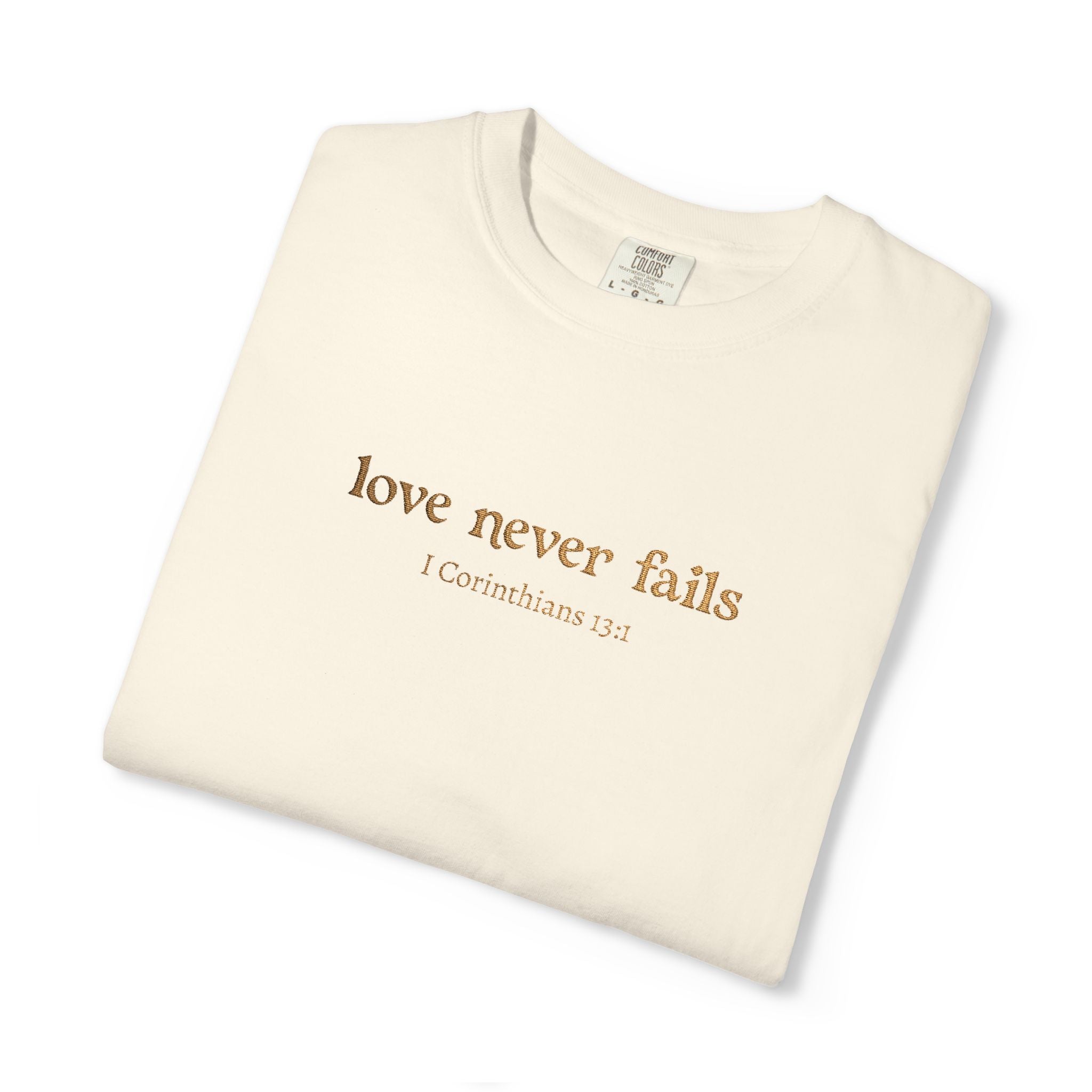 Love Never Fails Tee | Garment-Dyed 1 Corinthians Scripture T-Shirt