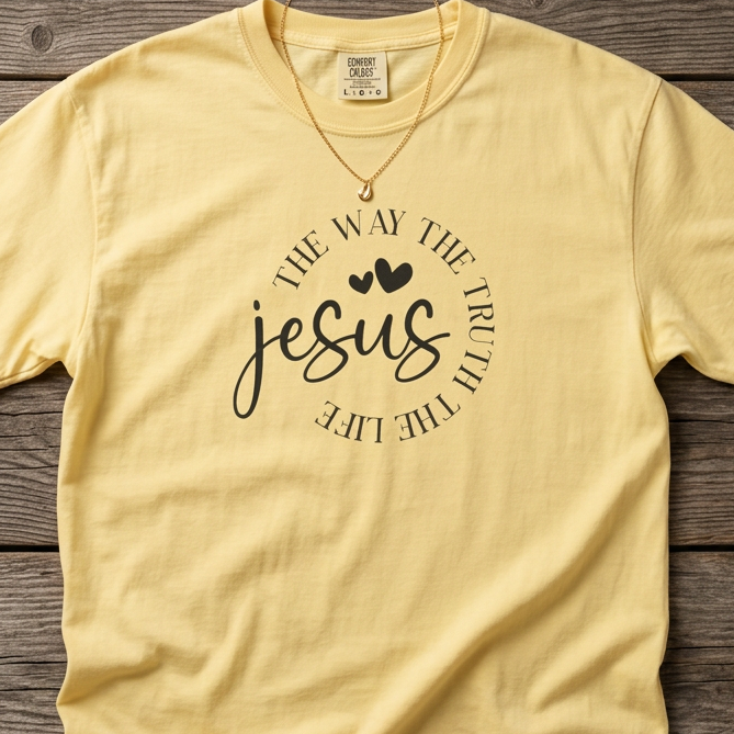 Flat-lay garment-dyed Christian t-shirt featuring the word “Jesus” with the circular text “The Way, The Truth, The Life” centered on the chest.