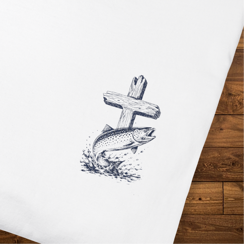 Folded white faith-based t-shirt featuring a small chest graphic of a fish and wooden cross design.