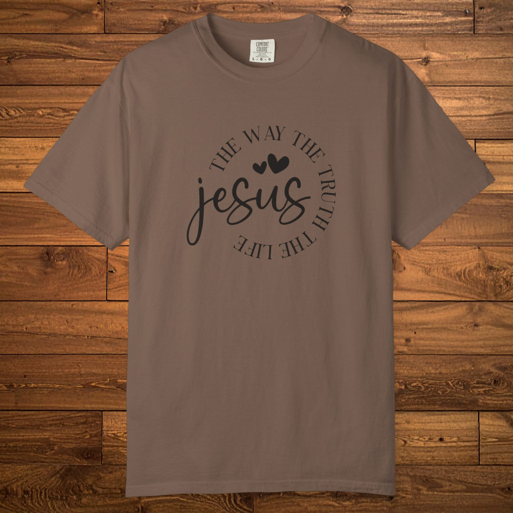 Flat-lay garment-dyed Christian t-shirt featuring the word “Jesus” with the circular text “The Way, The Truth, The Life” centered on the chest.