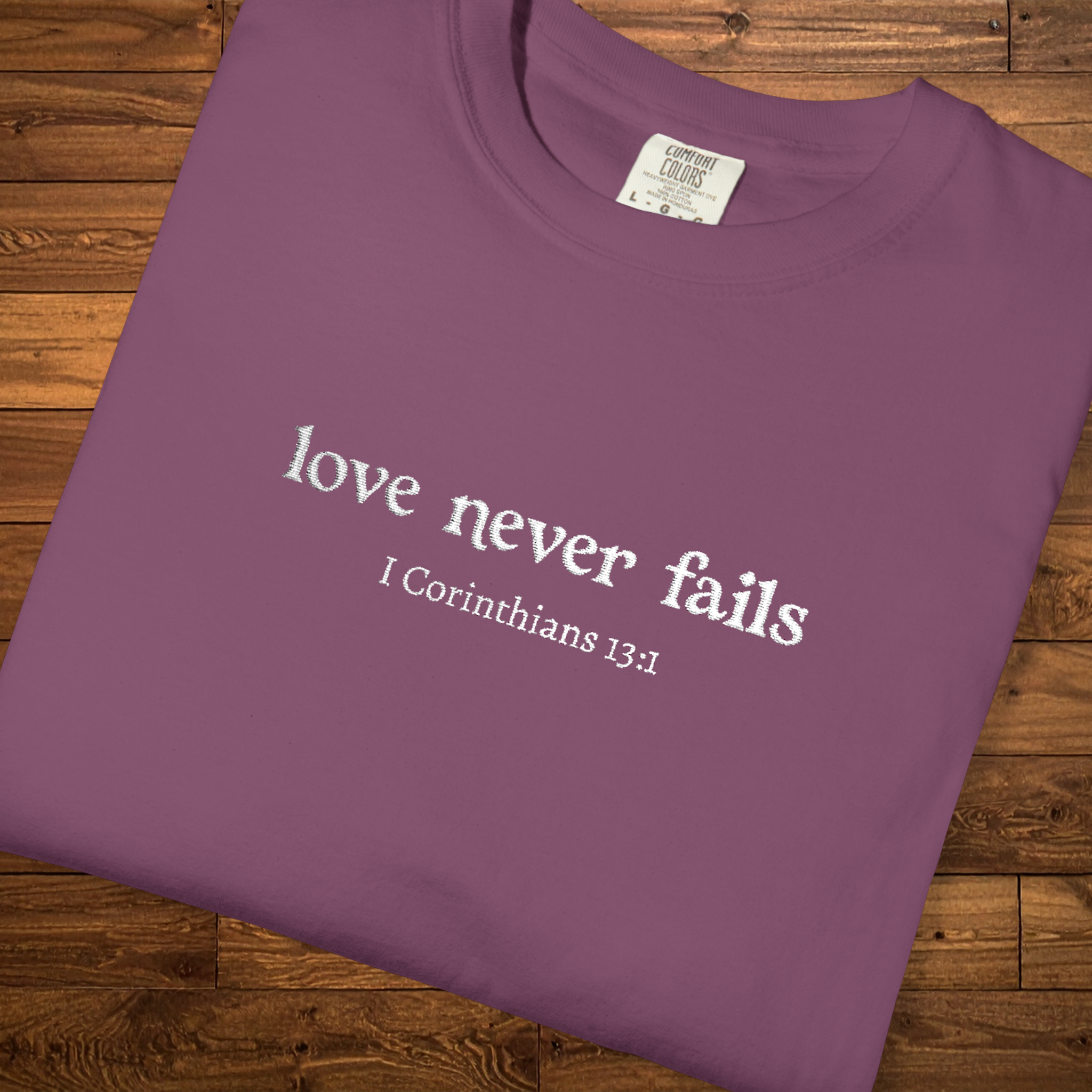 Love Never Fails Tee | White Embroidery | 1 Corinthians Scripture T-Shirt